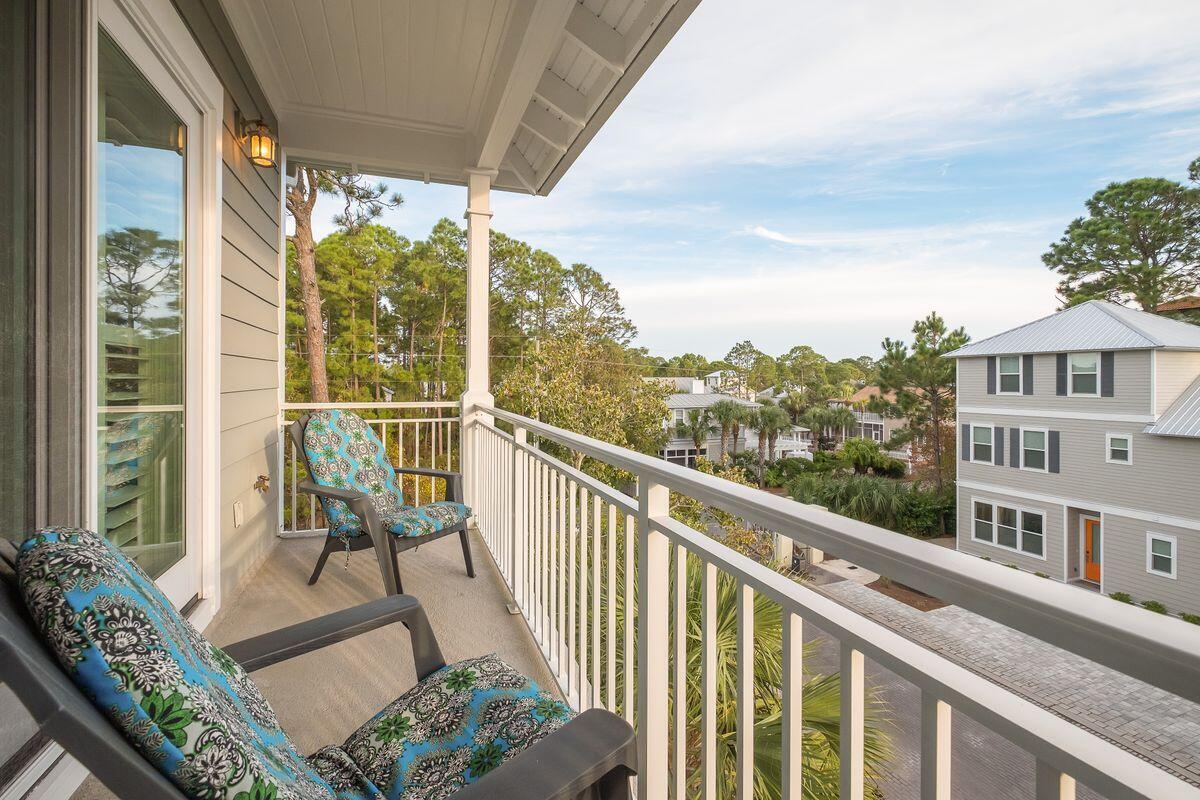 20 Sawgrass Lane Santa Rosa Beach, FL 32459 - Photo 14 of 25 a view of a city from a balcony with furniture