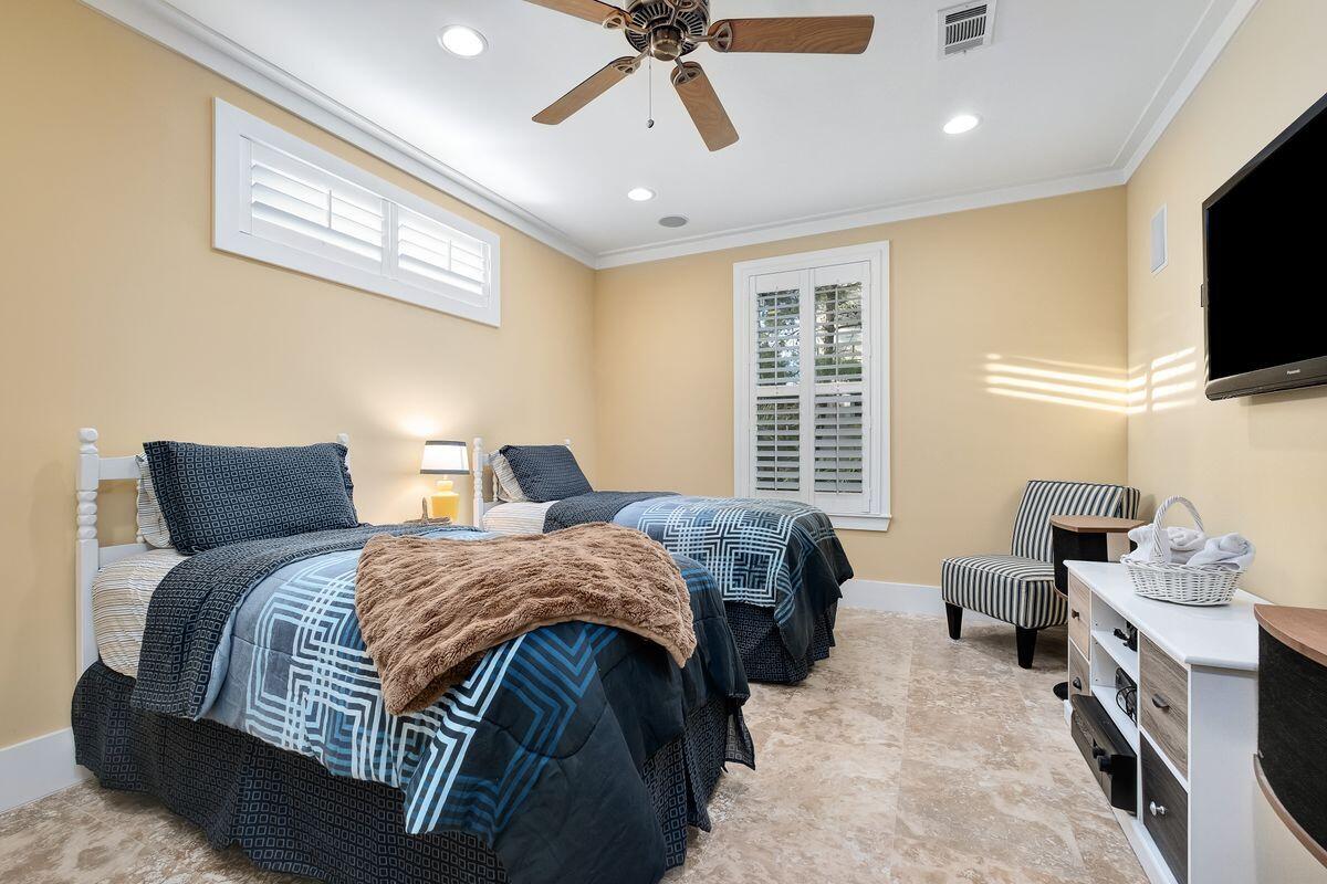 20 Sawgrass Lane Santa Rosa Beach, FL 32459 - Photo 15 of 25 a bedroom with a bed and a flat screen tv