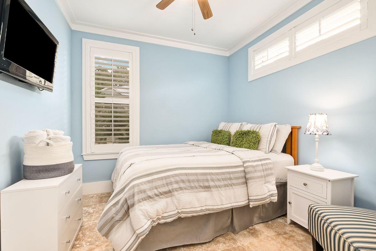 20 Sawgrass Lane Santa Rosa Beach, FL 32459 - Photo 16 of 25 a bedroom with a bed and flat screen tv