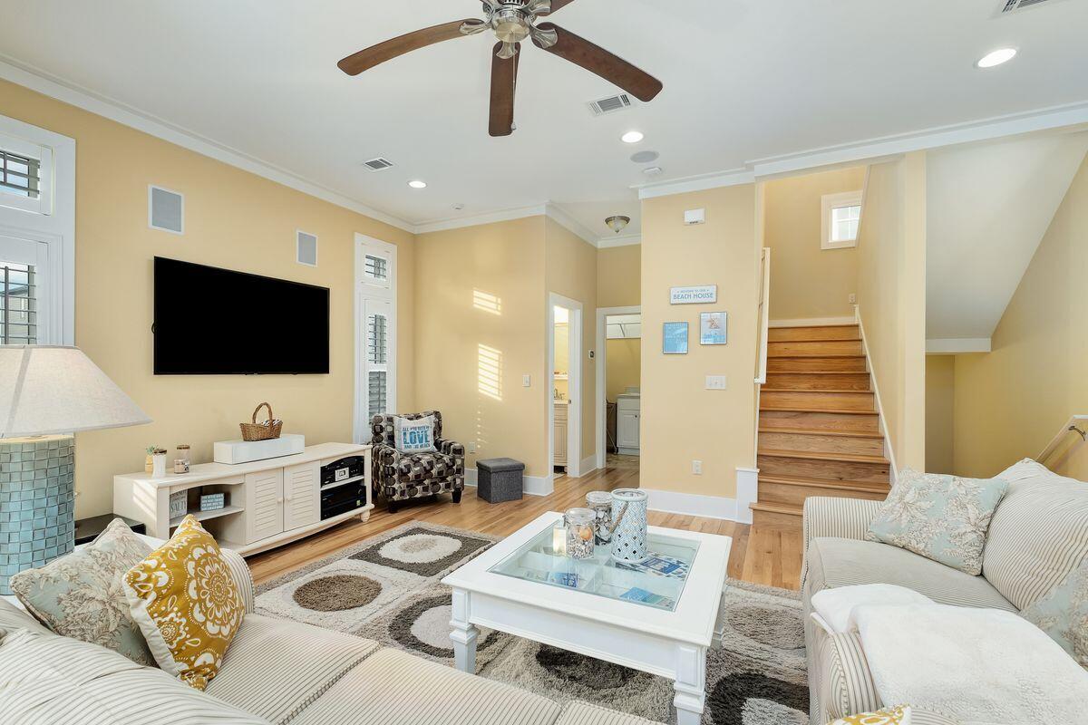 20 Sawgrass Lane Santa Rosa Beach, FL 32459 - Photo 9 of 25 a living room with furniture fireplace and a flat screen tv