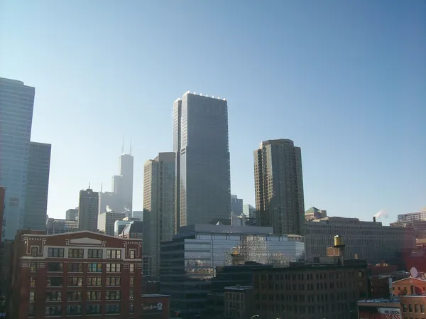 a view of city with tall buildings