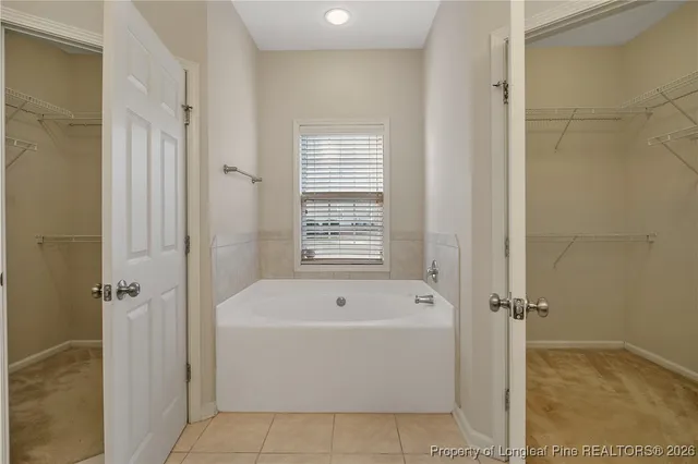a bathroom with a bathtub