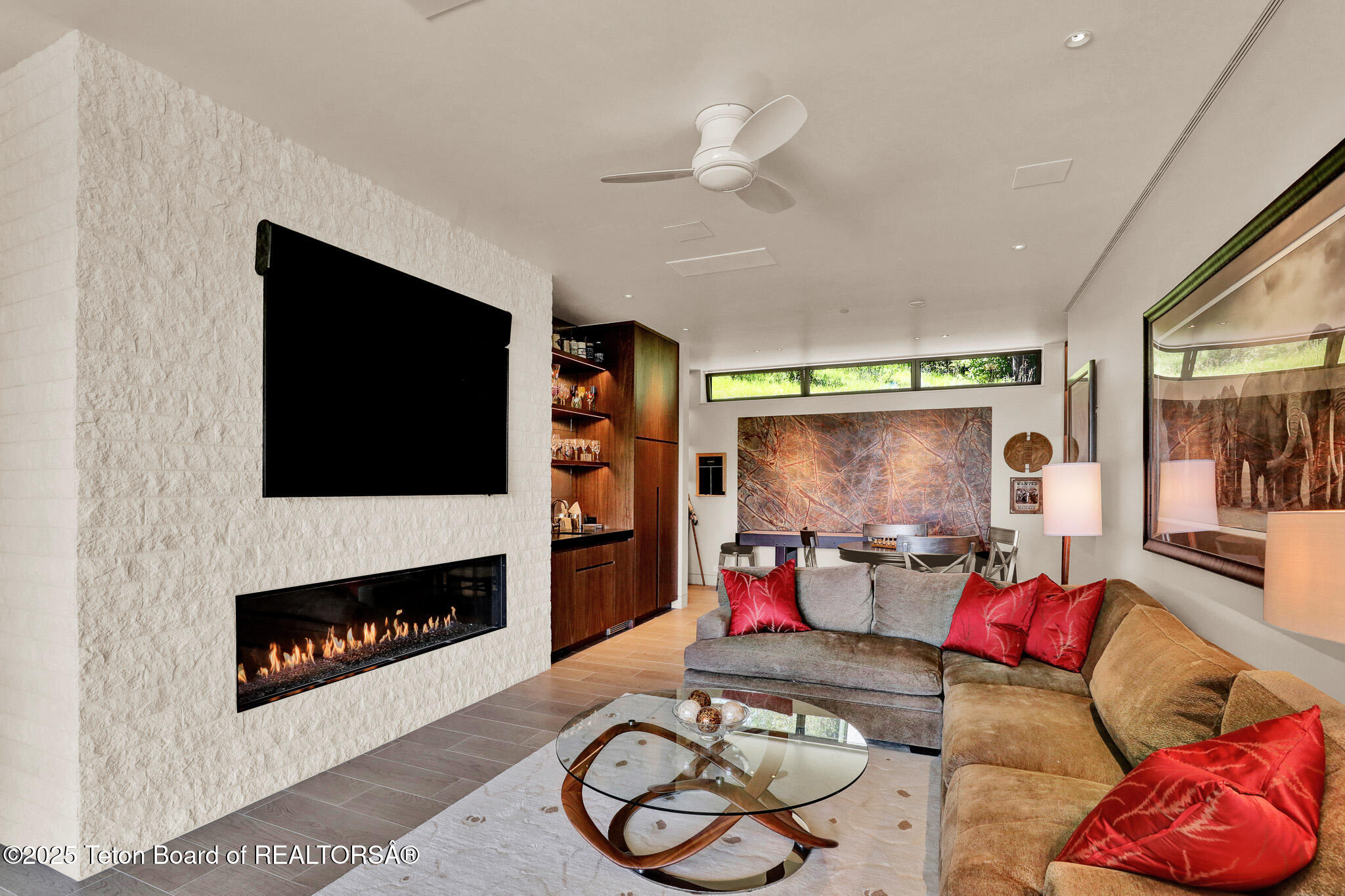 200 North W Ridge Road Jackson, WY 83001 - Photo 35 of 61 Game room with fireplace