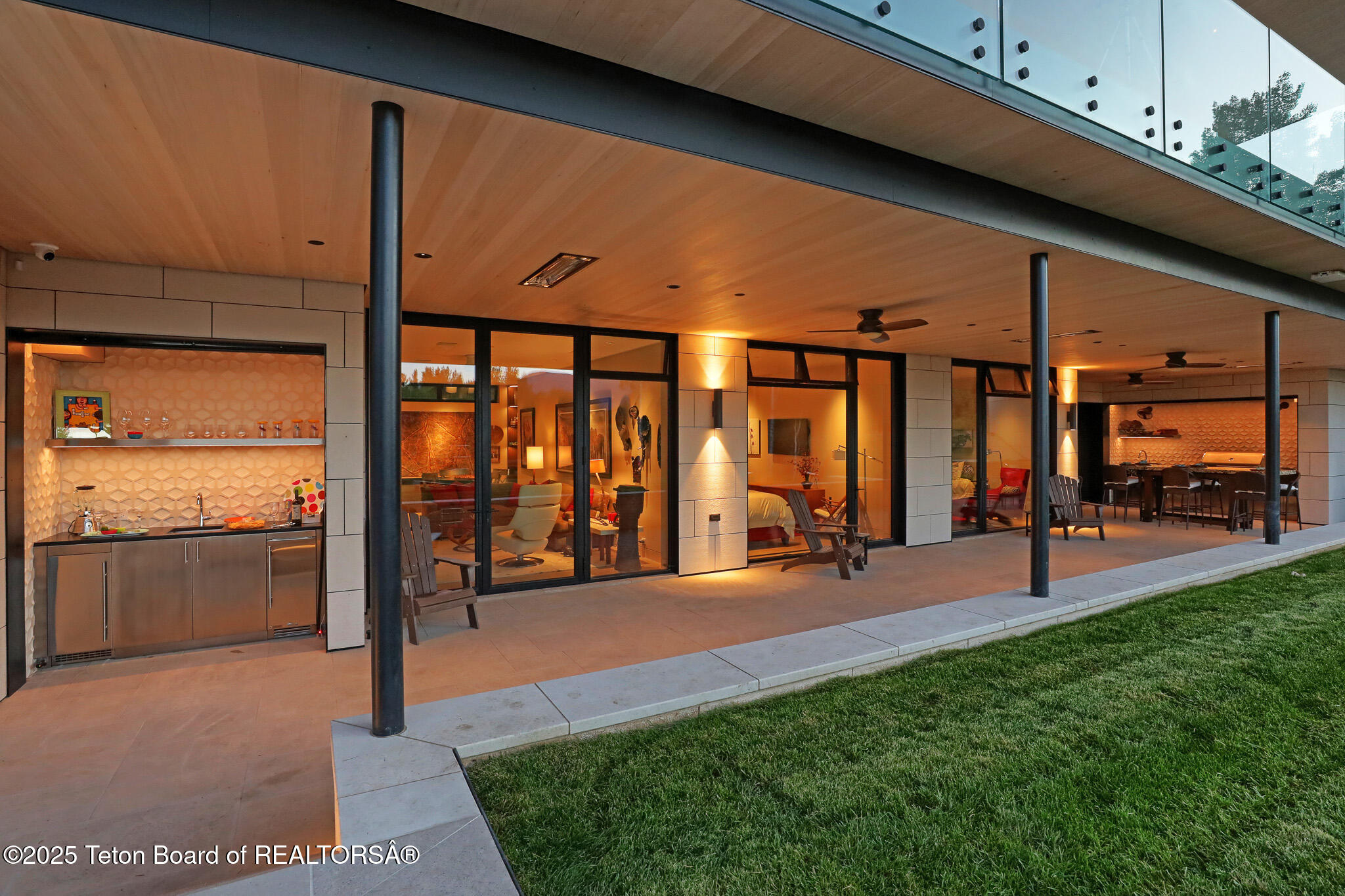200 North W Ridge Road Jackson, WY 83001 - Photo 37 of 61 Lower level patio entertaining area