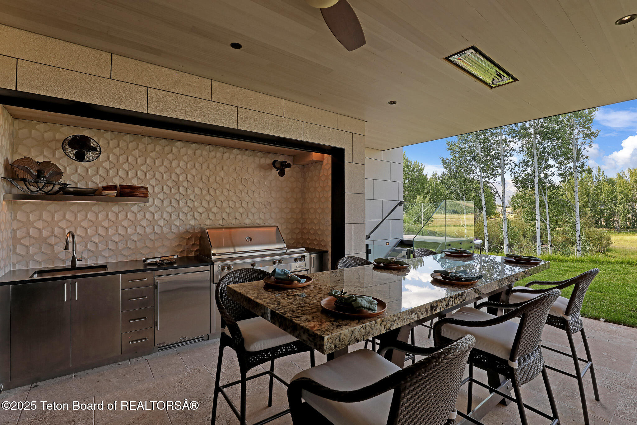 200 North W Ridge Road Jackson, WY 83001 - Photo 39 of 61 Outdoor kitchen and eating area