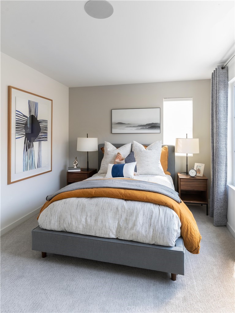 1479 Azalea Circle Gardena, CA 90247 - Photo 18 of 33 a bedroom with a bed and window