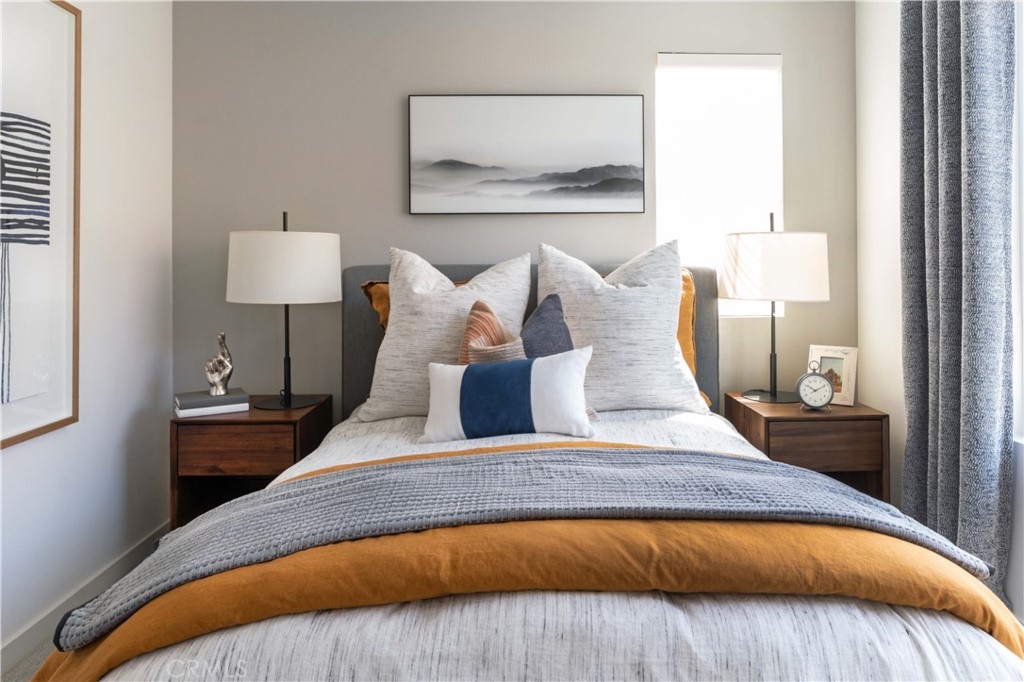 1479 Azalea Circle Gardena, CA 90247 - Photo 19 of 33 a bed sitting in a bedroom next to a window