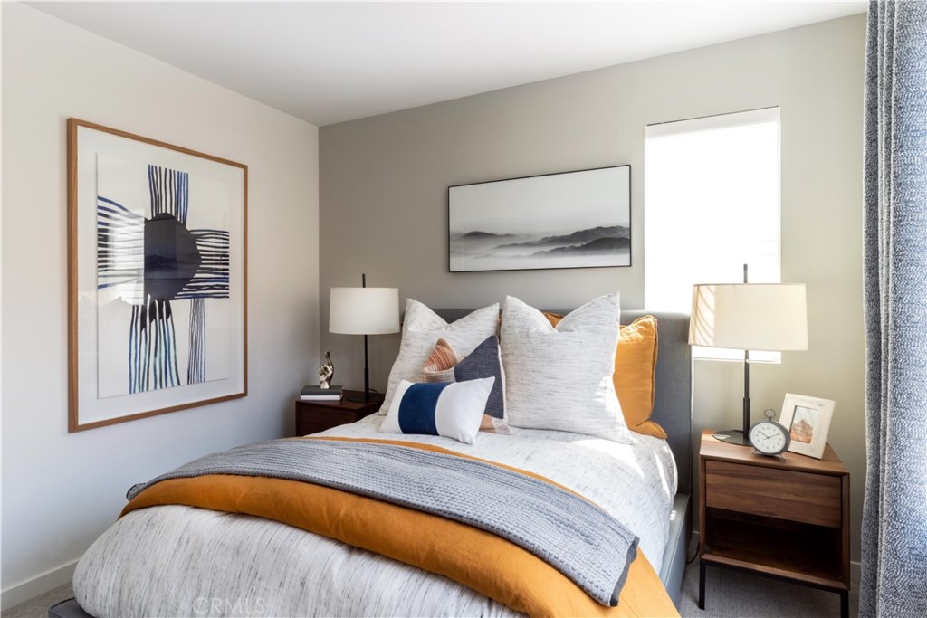 1479 Azalea Circle Gardena, CA 90247 - Photo 20 of 33 a bedroom with bed and night stand