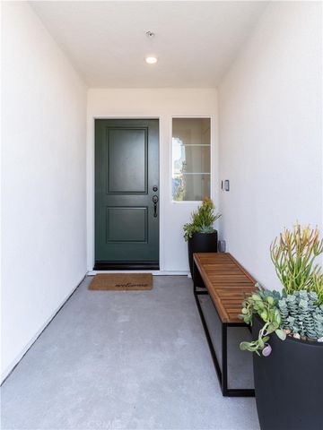 an entryway with a flower pot
