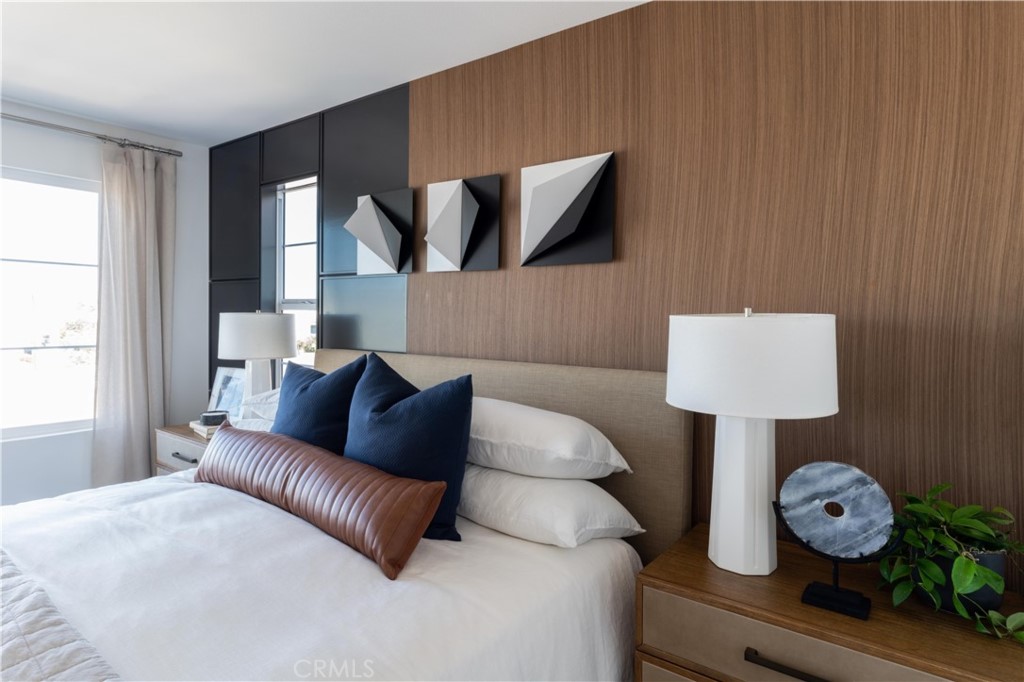 1479 Azalea Circle Gardena, CA 90247 - Photo 28 of 33 a living room with furniture and a window