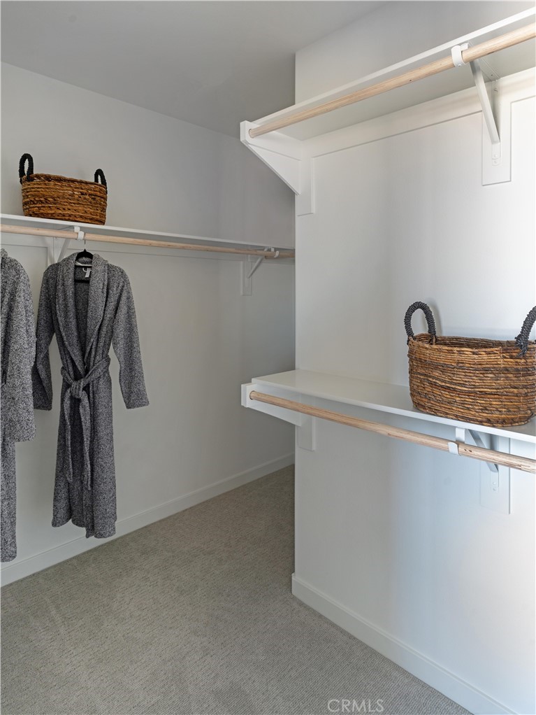 1479 Azalea Circle Gardena, CA 90247 - Photo 29 of 33 a view of walk in closet with clothes and shoes
