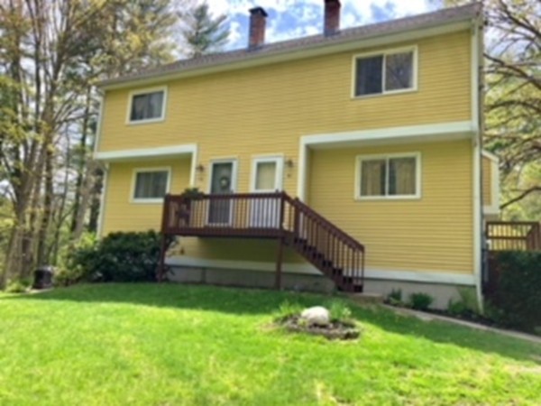 11 R Gamache Road, Unit 11R Derry, NH 03038 - Photo 1 of 20 a backyard of a house