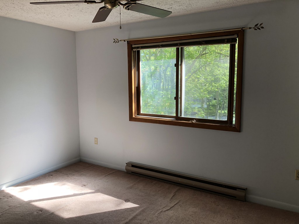 11 R Gamache Road, Unit 11R Derry, NH 03038 - Photo 19 of 20 an empty room with a window