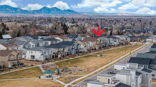 a view of a balcony with two chairs