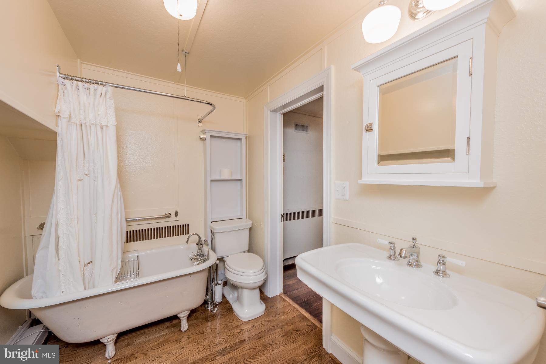 812 Bellemore Road Baltimore, MD 21210 - Photo 14 of 30 Imaging soaking in that claw foot tub...Ahh!