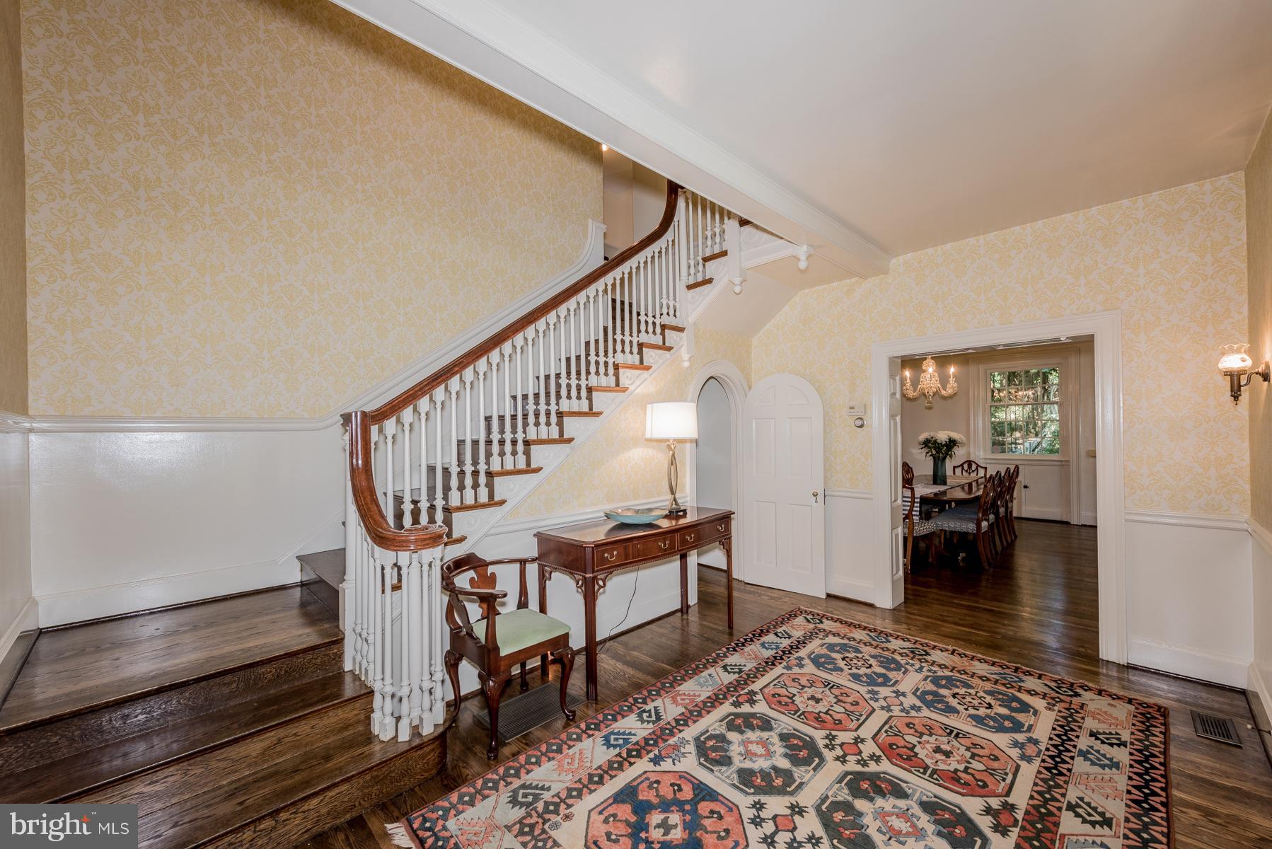 812 Bellemore Road Baltimore, MD 21210 - Photo 4 of 30 Soaring entry with gingerbread bracket staircase