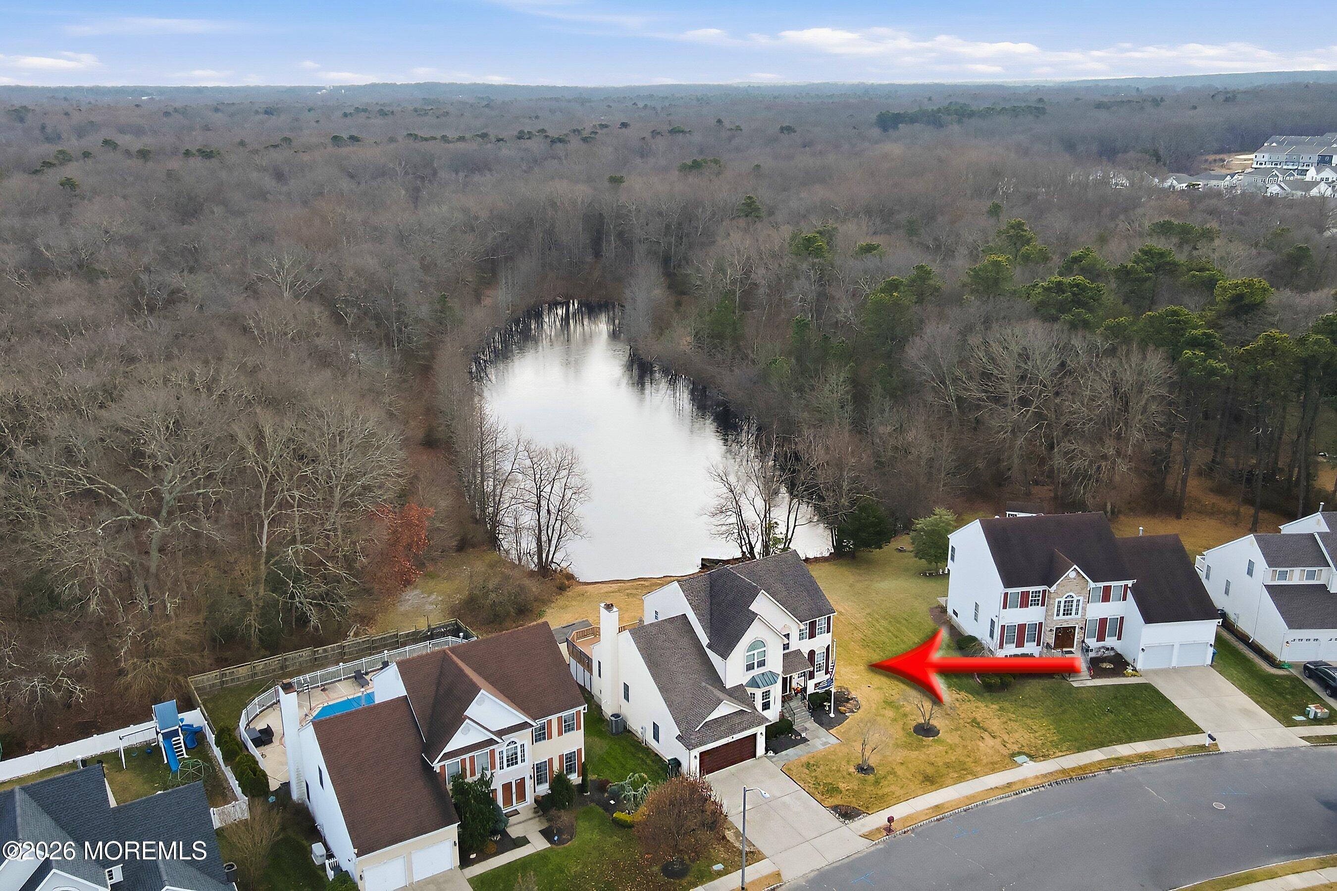 24 Gristmill Road Howell, NJ 07731 - Photo 4 of 46 Front Left Aerial ARROW