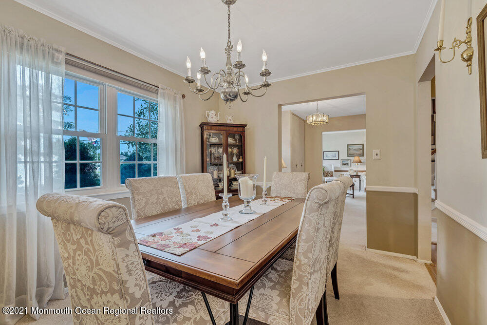 24 Limerick Place Hazlet, NJ 07730 - Photo 12 of 36 a view of a dining room with furniture window and outside view