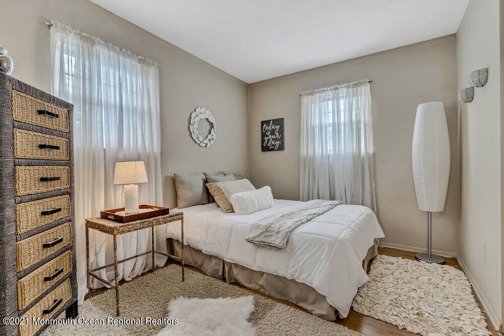 24 Limerick Place Hazlet, NJ 07730 - Photo 24 of 36 a bedroom with a bed and a dresser