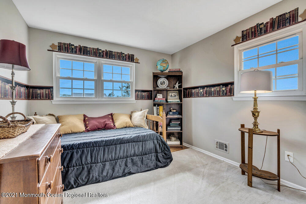 24 Limerick Place Hazlet, NJ 07730 - Photo 28 of 36 a bedroom with furniture and a window