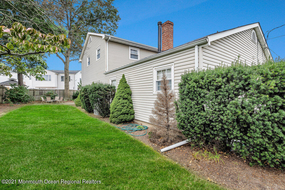 24 Limerick Place Hazlet, NJ 07730 - Photo 36 of 36 a view of a back yard of the house