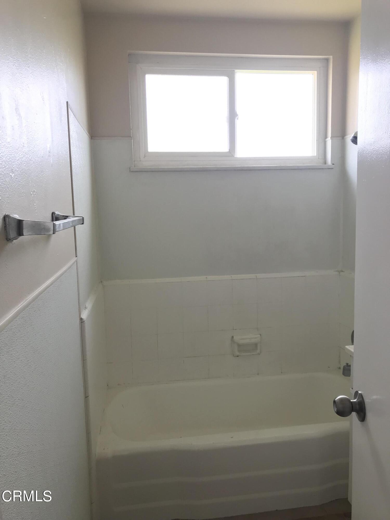 3148 Napa Street Oxnard, CA 93033 - Photo 11 of 15 a bathroom with a bathtub