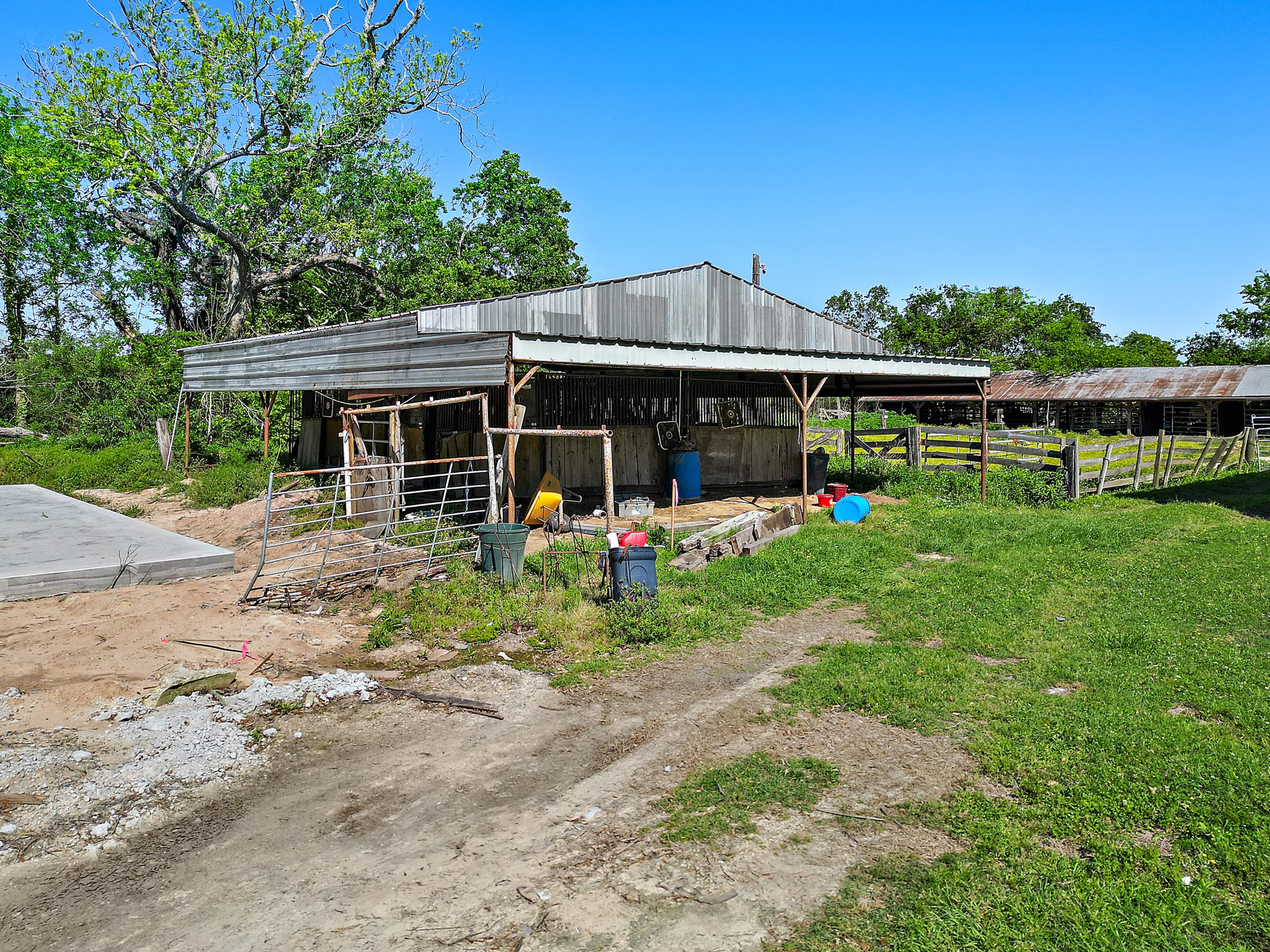 406 Main Street Winnie, TX 77665 - Photo 14 of 20 a front view of a house with garden