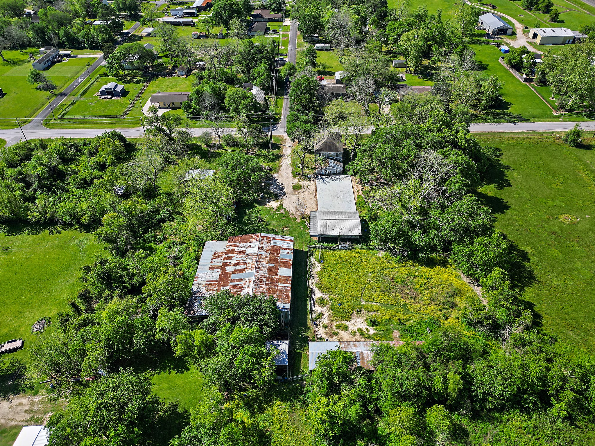 406 Main Street Winnie, TX 77665 - Photo 3 of 20 a view of a garden with a building