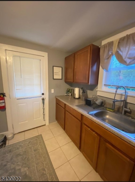 3 Plane Street Stanhope, NJ 07874 - Photo 8 of 25 a kitchen with stainless steel appliances granite countertop a sink and cabinets