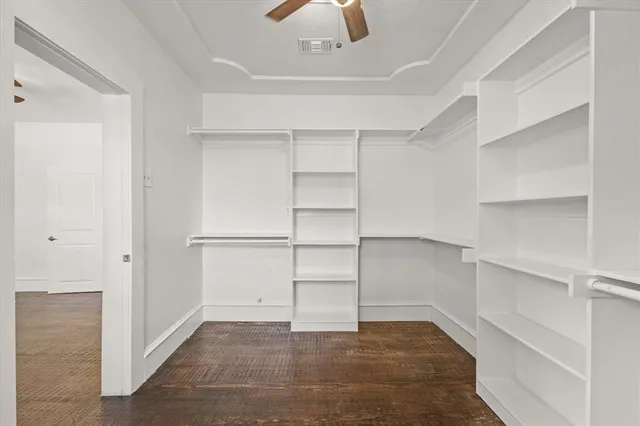 a view of an empty walk in closet