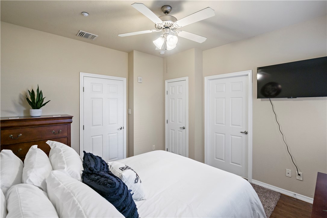 1198 Jones-Butler Road, Unit 2207 College Station, TX 77840 - Photo 11 of 14 a bedroom with a bed and a television