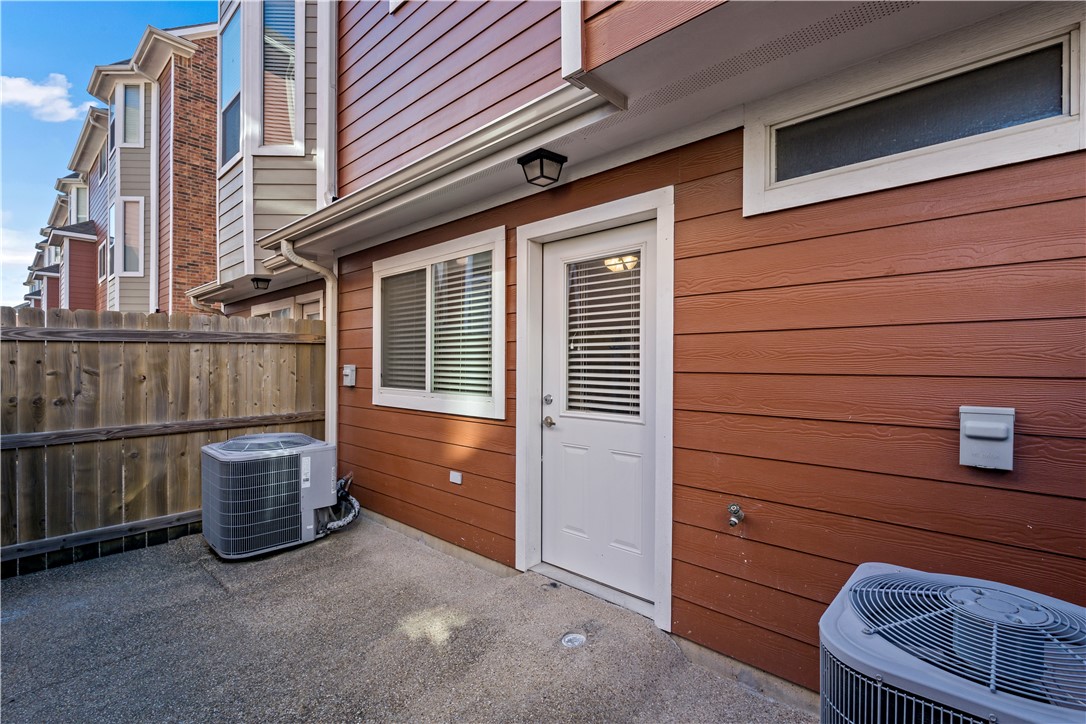 1198 Jones-Butler Road, Unit 2207 College Station, TX 77840 - Photo 13 of 14 a view of a house with a wooden deck