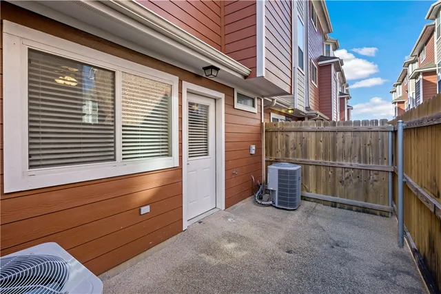 a view of a backyard with furniture