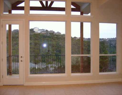 a view of a door and a window