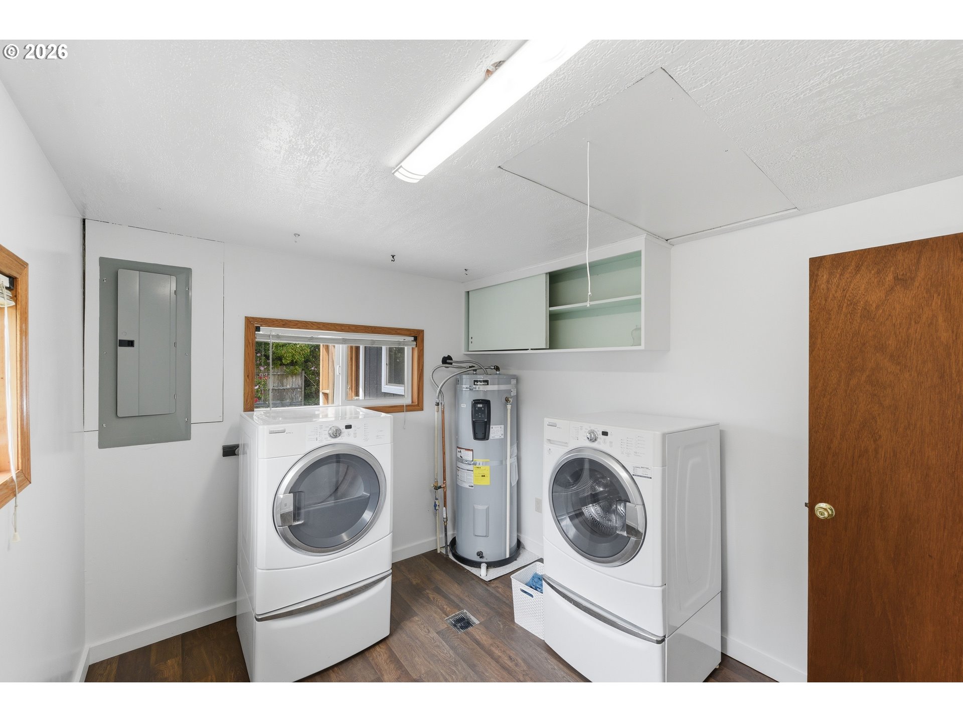 63299 Wildahl Road Coos Bay, OR 97420 - Photo 17 of 45 a utility room with dryer and washer