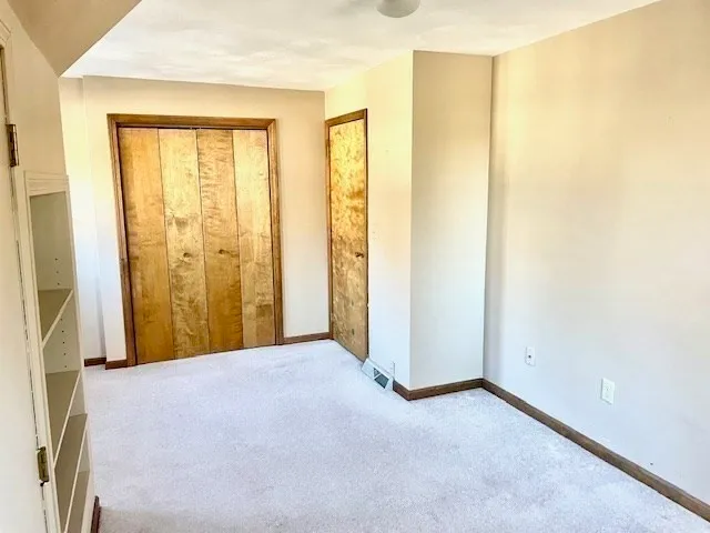 a view of a room with an empty room