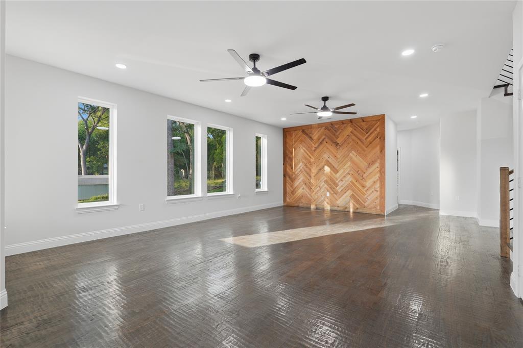 2150 Lakeview Mabank, TX 75156 - Photo 16 of 36 a view of an empty room with wooden floor and a window