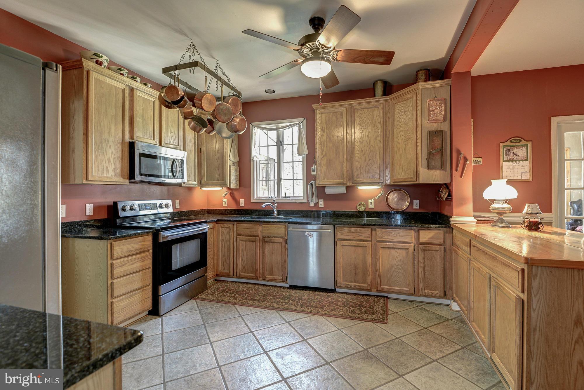 35084 Sunny Ridge Road Round Hill, VA 20141 - Photo 14 of 30 Kitchen granite and cherry counter tops