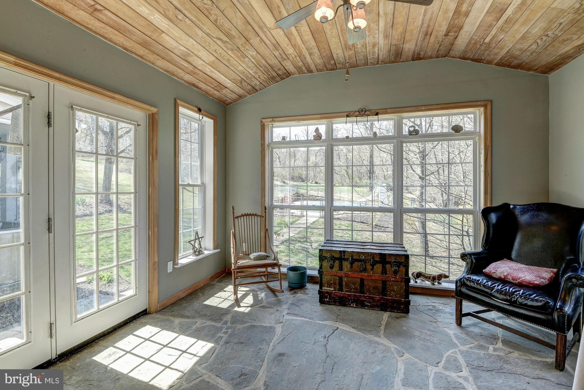 35084 Sunny Ridge Road Round Hill, VA 20141 - Photo 20 of 30 Stone flooring in sunroom