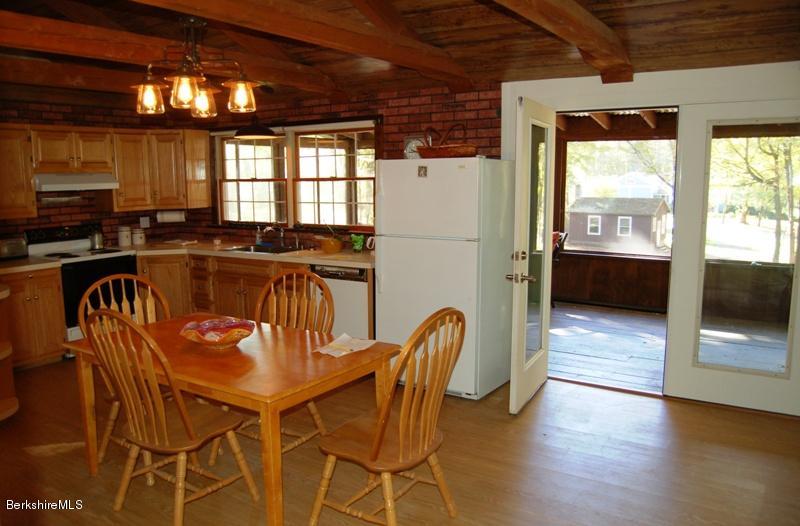 132 Cross Road Richmond, MA 01254 - Photo 5 of 14 a view of a dining room with furniture and wooden floor