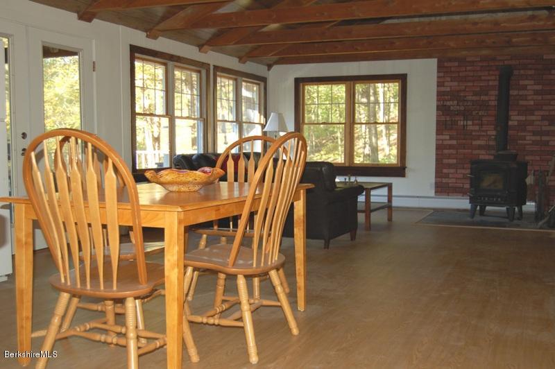 132 Cross Road Richmond, MA 01254 - Photo 6 of 14 a view of a dining room with furniture and chandelier