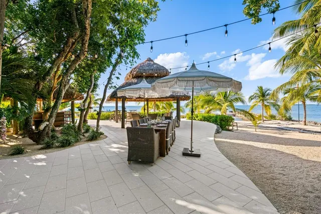 a bedroom with furniture and a wooden floor