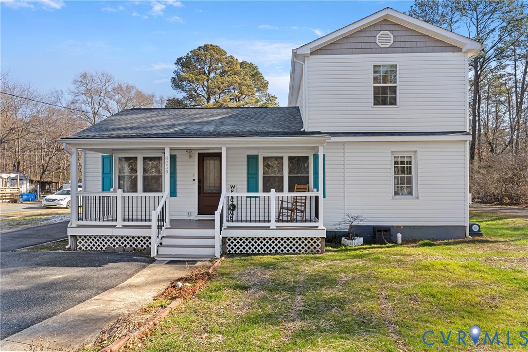 8059 Varina Road Henrico, VA 23231 - Photo 1 of 45 a front view of a house with garden