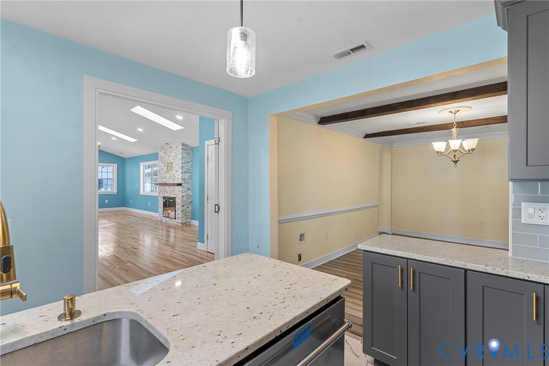 8059 Varina Road Henrico, VA 23231 - Photo 11 of 45 a kitchen with a sink and refrigerator