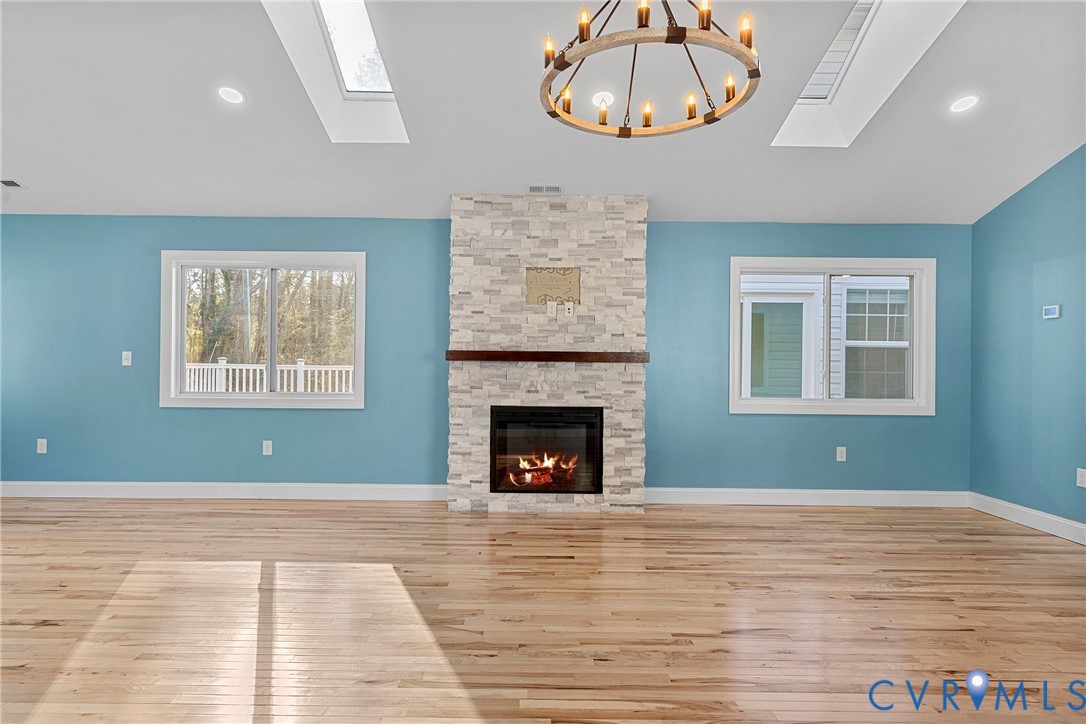 8059 Varina Road Henrico, VA 23231 - Photo 13 of 45 a view of a livingroom with a fireplace window and wooden floor
