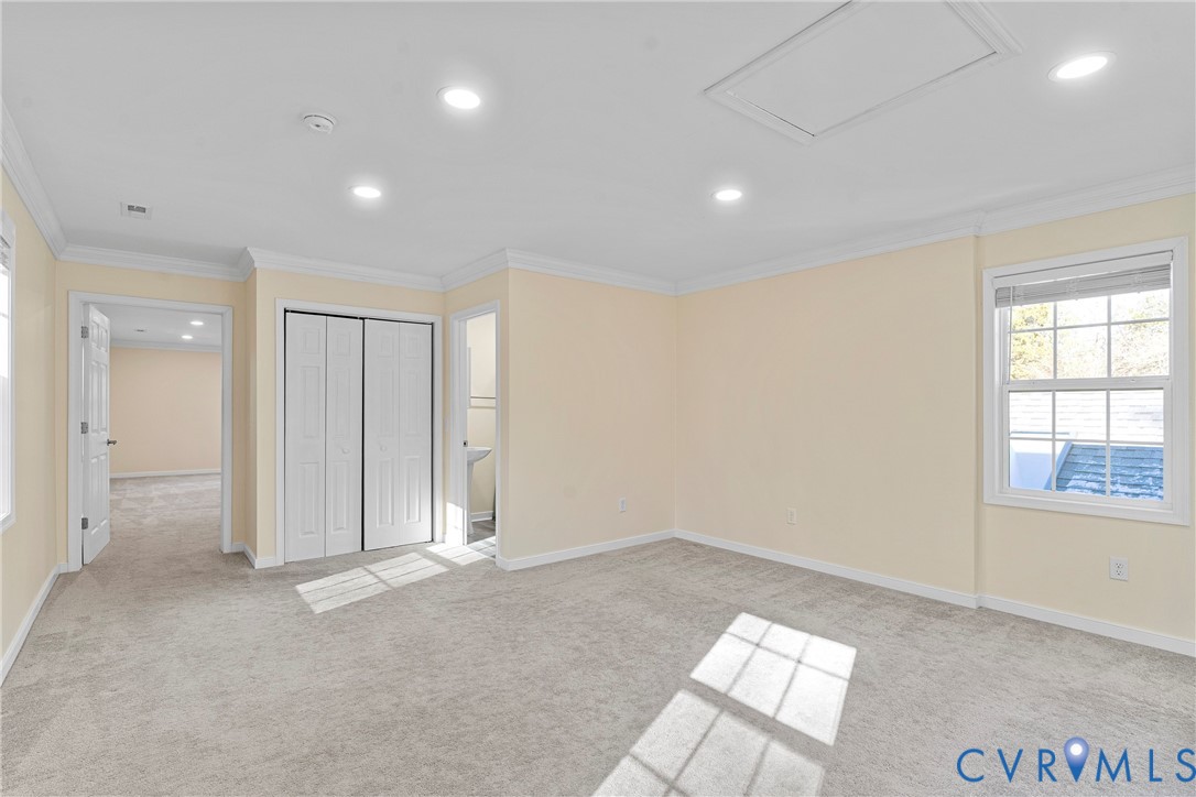 8059 Varina Road Henrico, VA 23231 - Photo 24 of 45 an empty room with windows and closet