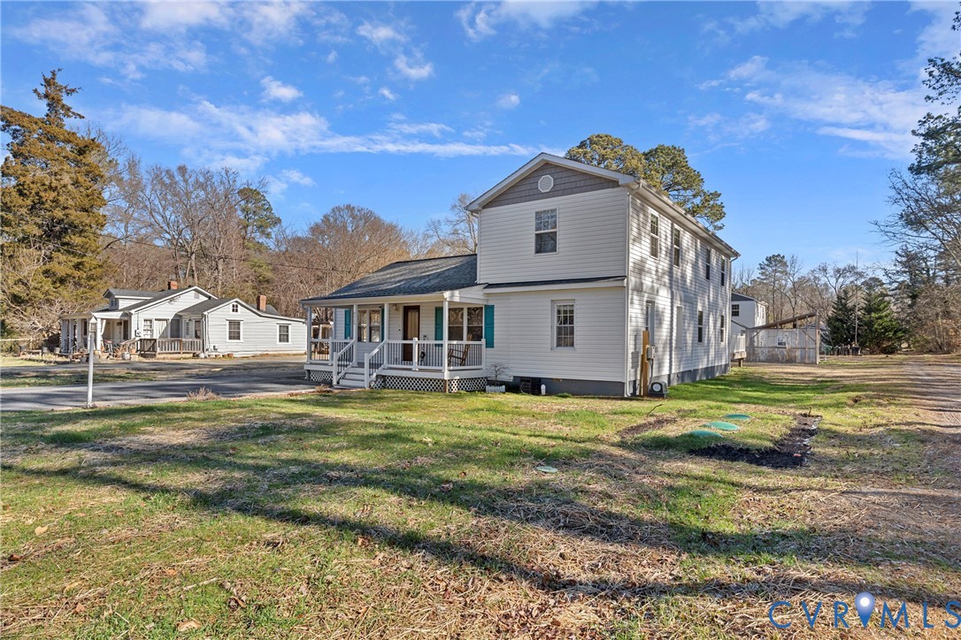 8059 Varina Road Henrico, VA 23231 - Photo 36 of 45 a view of a big house with a big yard and large trees