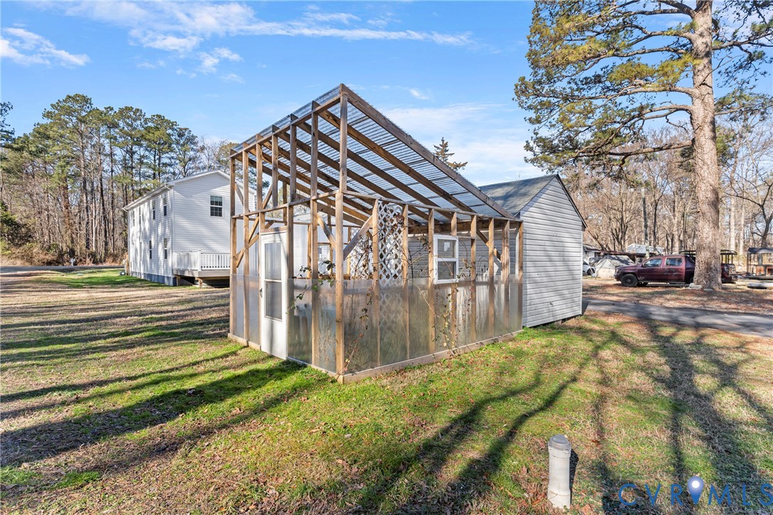 8059 Varina Road Henrico, VA 23231 - Photo 37 of 45 a view of a house with a yard