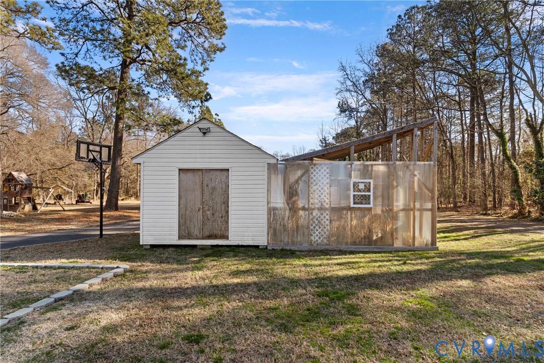 8059 Varina Road Henrico, VA 23231 - Photo 38 of 45 a front view of a house with a garden