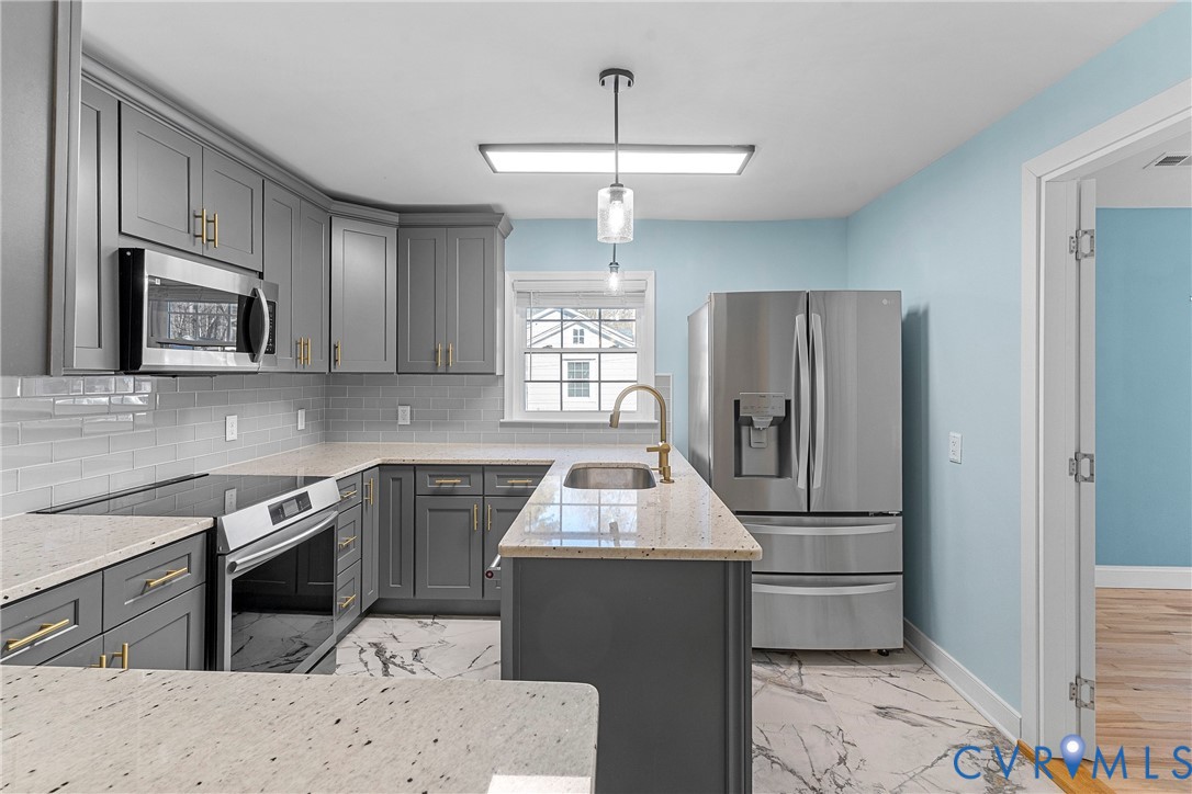 8059 Varina Road Henrico, VA 23231 - Photo 8 of 45 a kitchen with a refrigerator sink and microwave